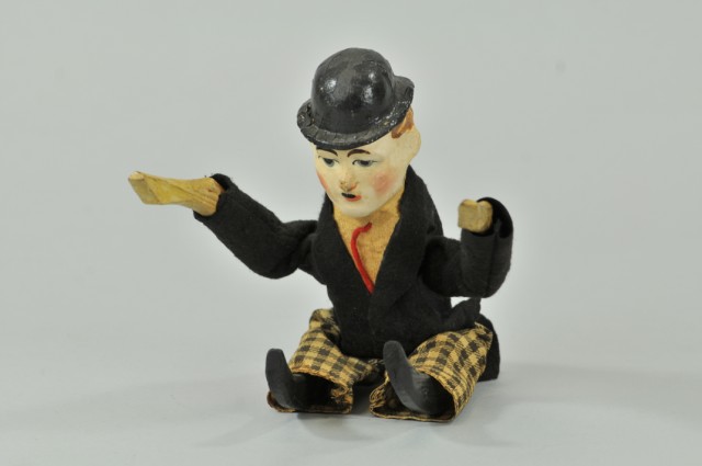 CHARLIE CHAPLIN TUMBLER FIGURE Hand