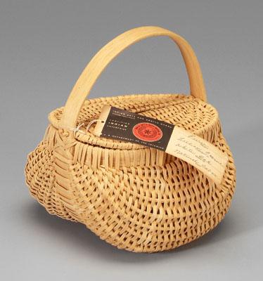 Cherokee oak split lidded purse,