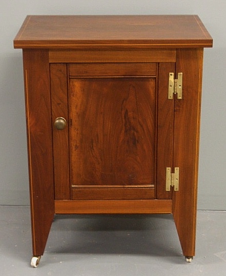 Cherry one-drawer cabinet with a