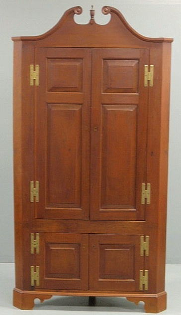 Cherry one-piece corner cupboard
