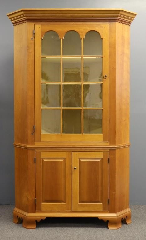 Cherry two-piece corner cabinet,