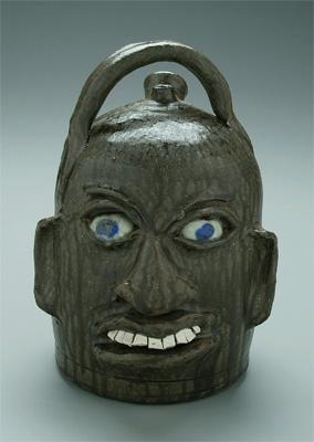 Chester Hewell face jug, monkey jug