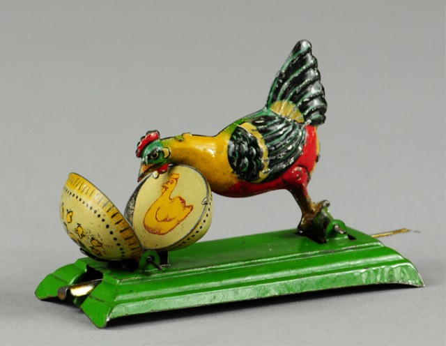 CHICKEN CRACKING EGG OPEN PENNY TOY