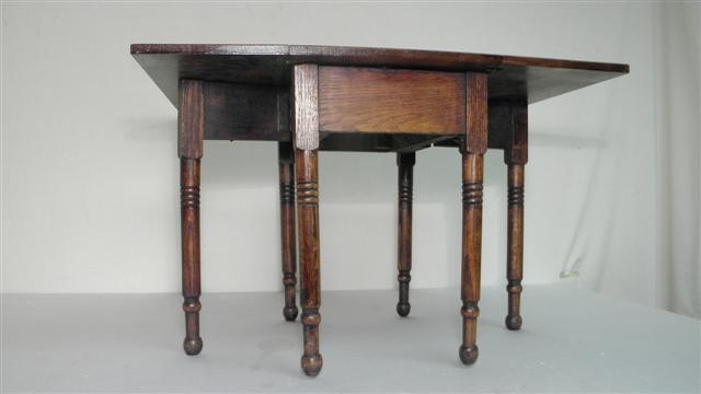 Child's mahogany drop leaf table.