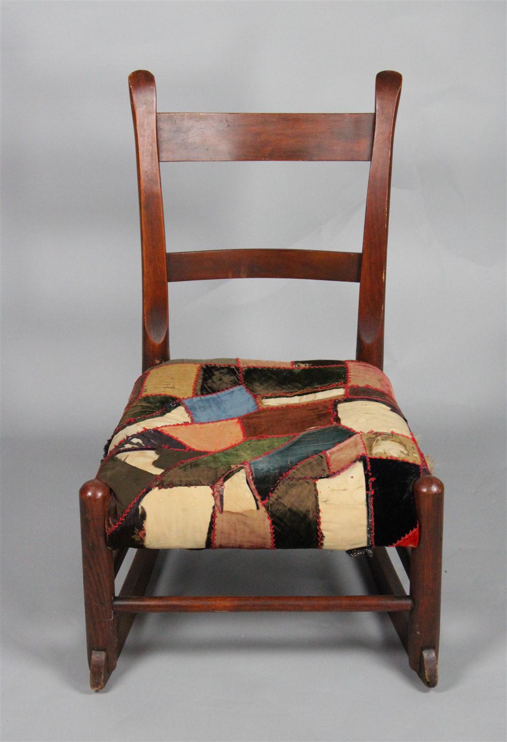 CHILD'S ROCKING CHAIR WITH PATCH