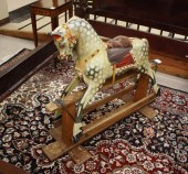 CHILD'S ROCKING HORSE ON STAND