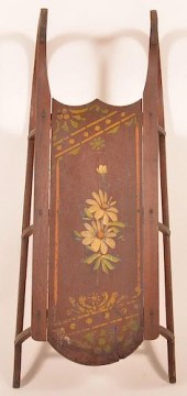 CHILDS SLED HAVING FLORAL AND