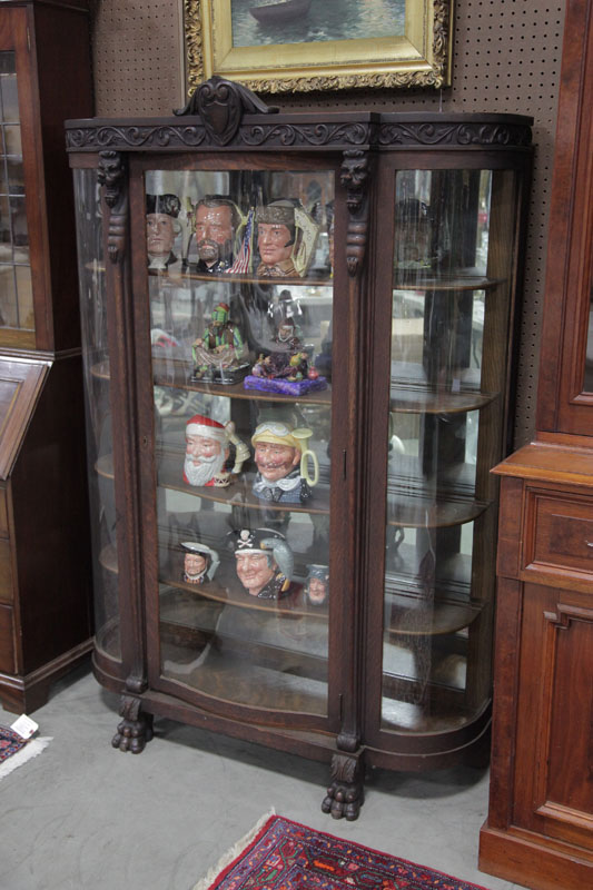 CHINA CABINENT. Oak curved glass