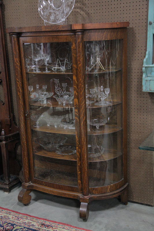 CHINA CABINET. Oak having curved