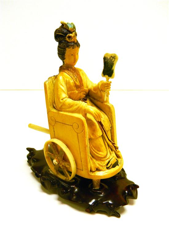 Chinese  20th C.  an ivory figure
