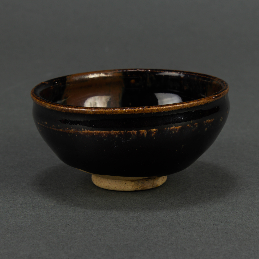 CHINESE BLACK GLAZED IRON SPLASH