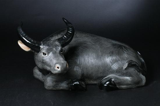 CHINESE BLACK PORCELAIN FIGURE OF