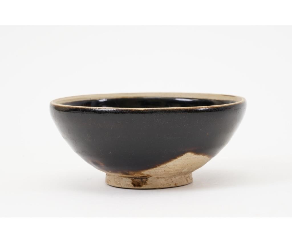 Chinese blackware tea bowl with red