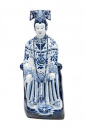 CHINESE BLUE AND WHITE SEATED