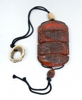 CHINESE CARVED AMBER COLORED I