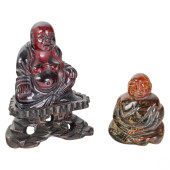CHINESE CARVED AMBER SEATED BU