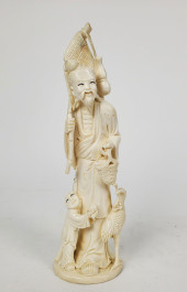 CHINESE CARVED FIGURE OF A SHO
