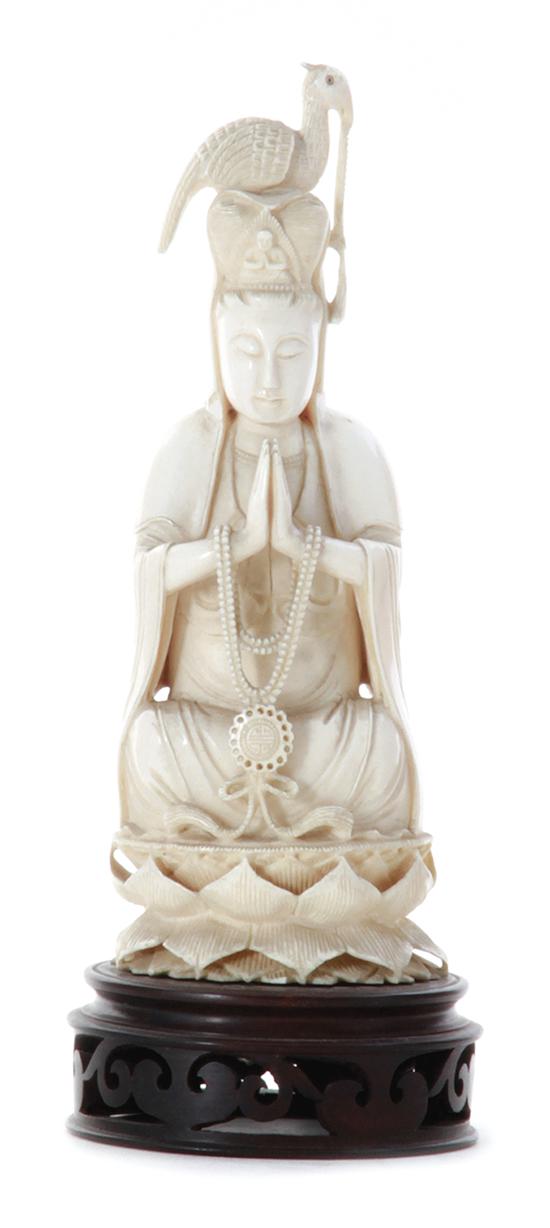 Chinese carved ivory deity circa