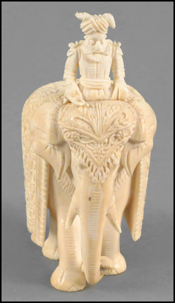 CHINESE CARVED IVORY ELEPHANT.