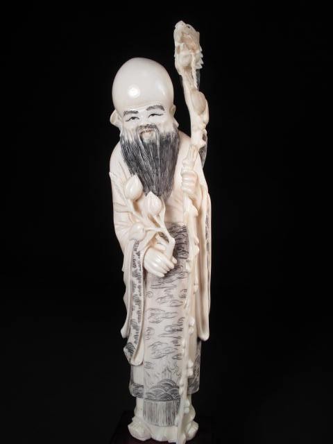 Chinese carved ivory figure.