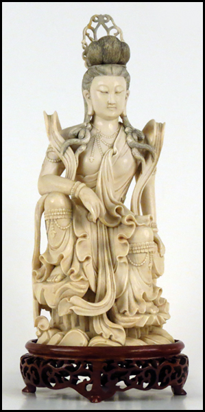 CHINESE CARVED IVORY FIGURE OF A