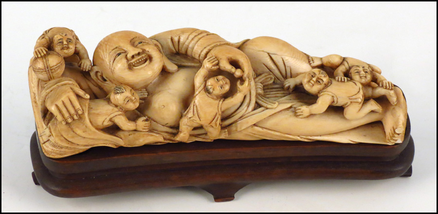 CHINESE CARVED IVORY FIGURE OF A