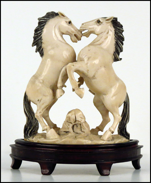 CHINESE CARVED IVORY FIGURE OF