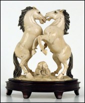 CHINESE CARVED IVORY FIGURE OF