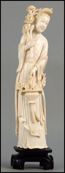 CHINESE CARVED IVORY FIGURE OF A