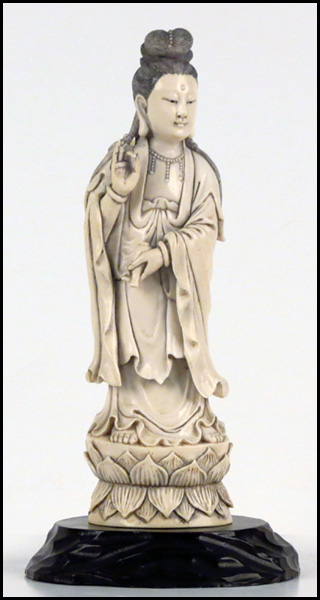 CHINESE CARVED IVORY FIGURE OF A