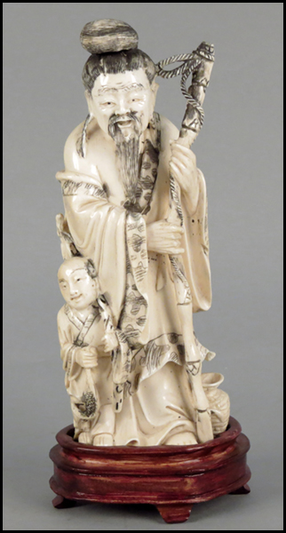 CHINESE CARVED IVORY FIGURE OF A