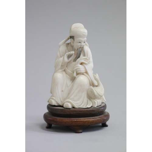 Chinese carved ivory figure of a