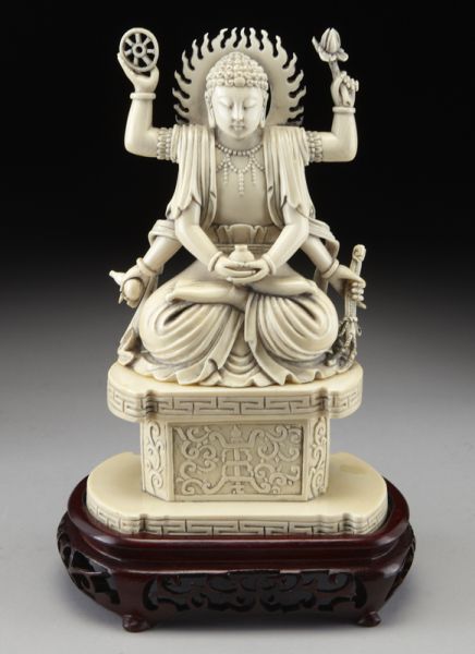 Chinese carved ivory six armed