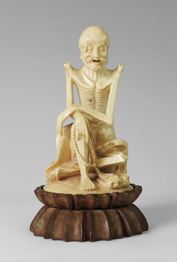 CHINESE CARVED IVORY SKELETAL LOHAN