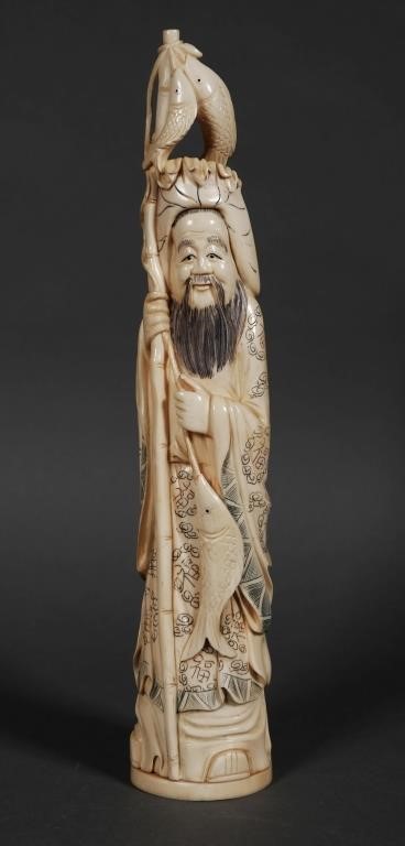 CHINESE CARVED IVORY STATUE OF A