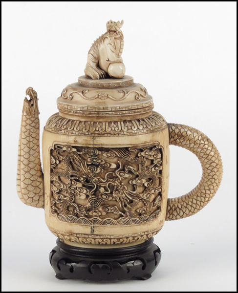CHINESE CARVED IVORY TEAPOT.