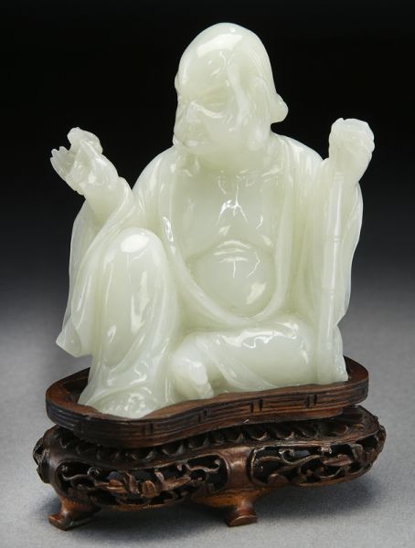Chinese carved jade Lohan raised on