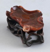 CHINESE CARVED RED AGATE LEAF-