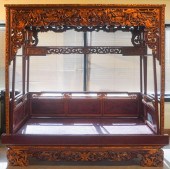 CHINESE CARVED RED AND GILT DE