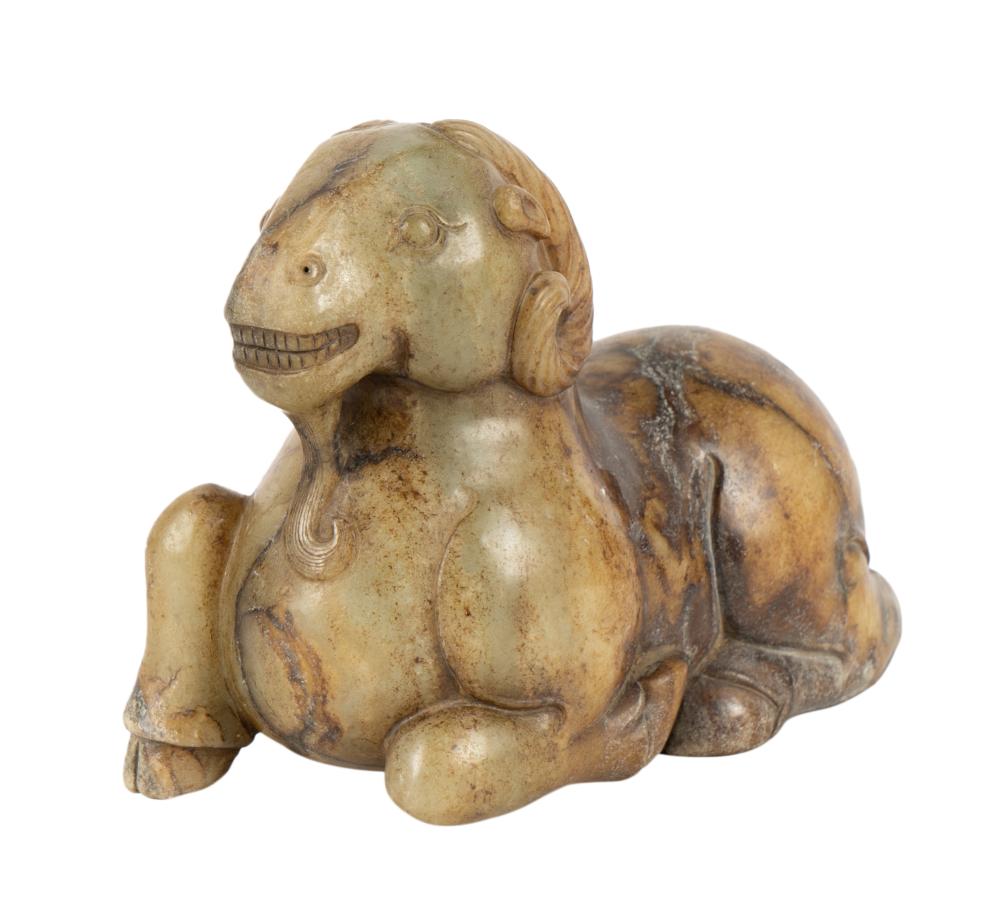 CHINESE CARVED STONE FIGURE OF A