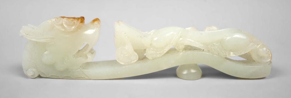 CHINESE CARVED WHITE AND RUSSET