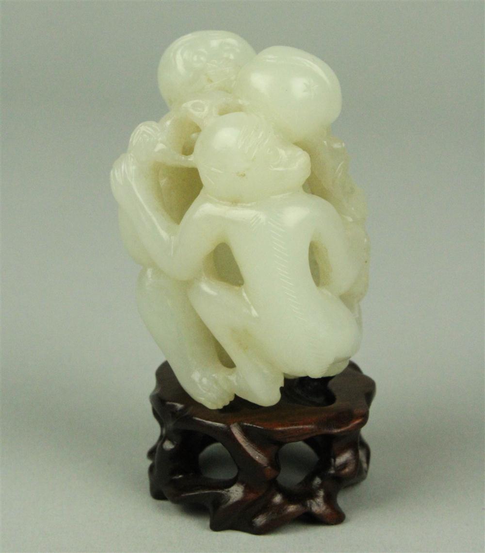CHINESE CARVED WHITE JADE MONKEY