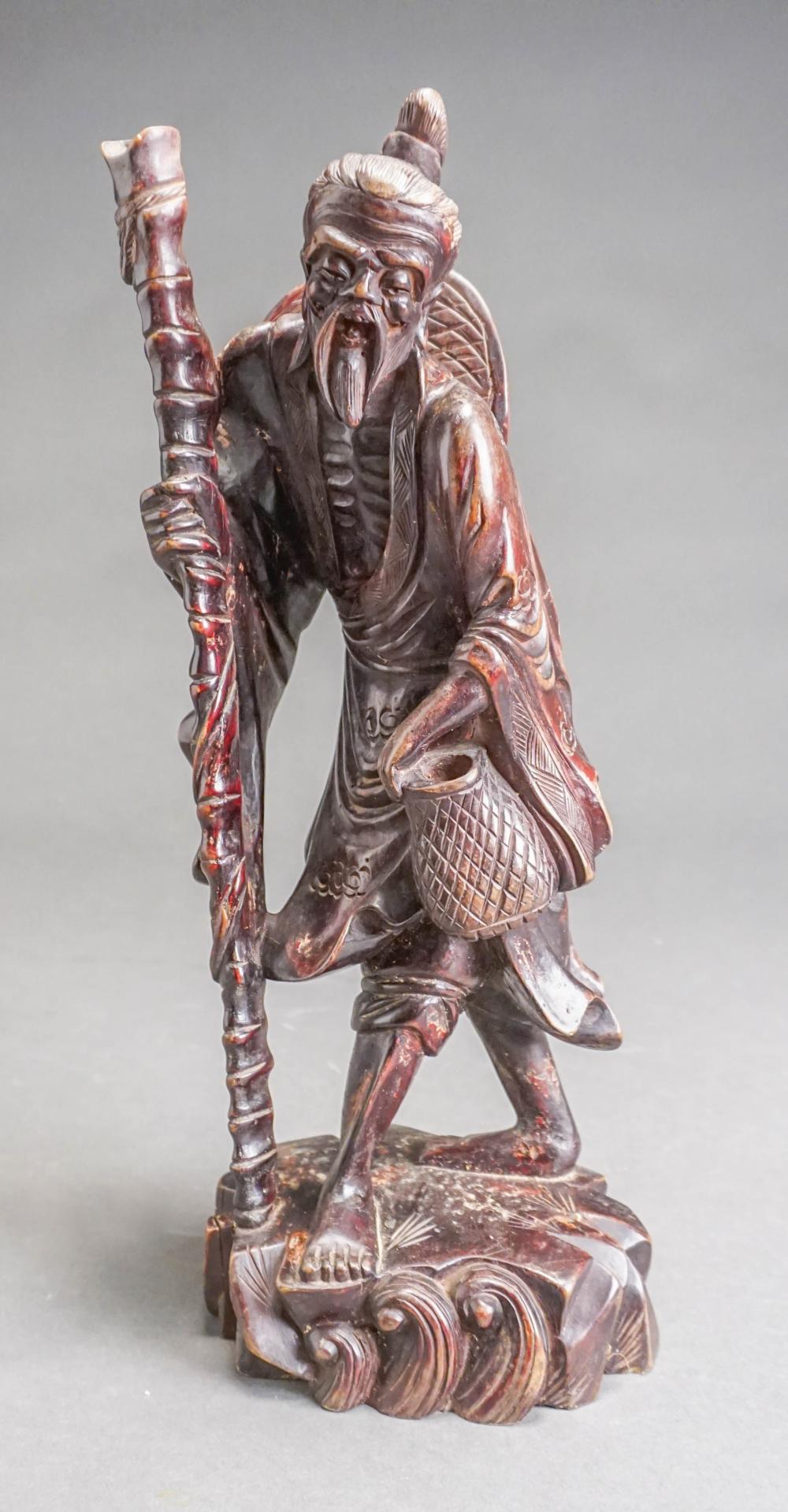 CHINESE CARVED WOOD FIGURE OF A