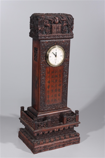 Chinese carved wooden clock set