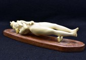 CHINESE CARVING OF A LADY ADMI