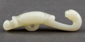 CHINESE CELADON JADE PRAYING M