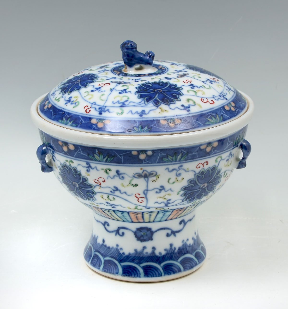 CHINESE DUCAI FOOTED DISH: A less