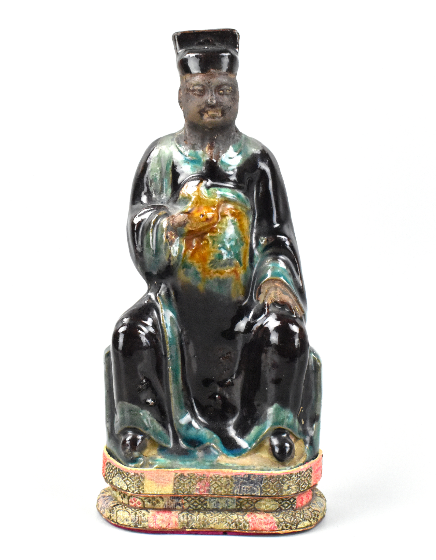 CHINESE FAHUA GLAZED SEATED FIGURE,