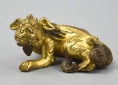 CHINESE GILDED BRONZE CROUCHIN