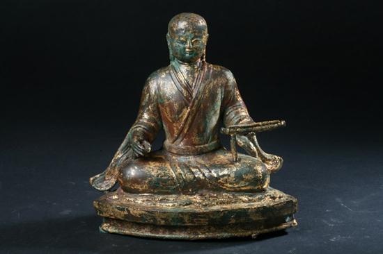 CHINESE GILT BRONZE FIGURE OF MONK.